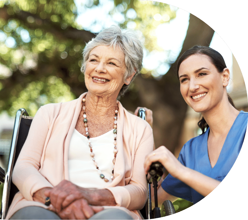 Elderly Woman and Doctor Sitting Together