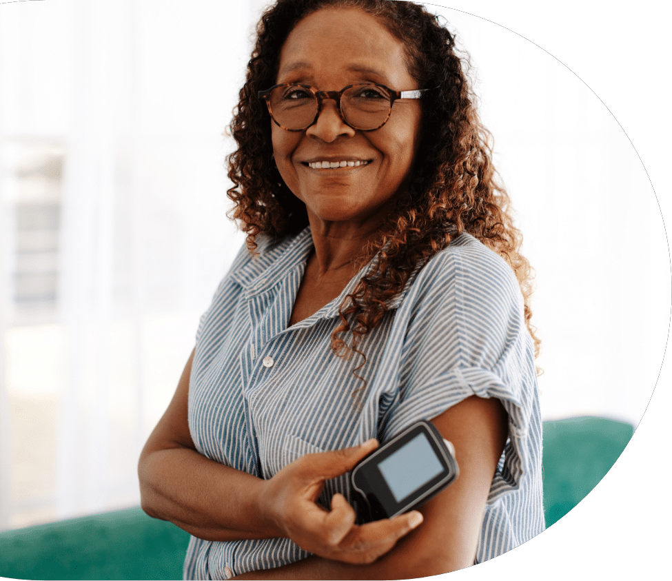 older woman checking vitals after her diagnosis of diabetes in seniors