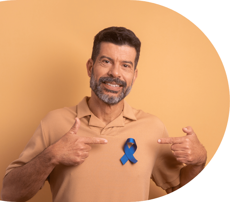 Man with a blue ribbon representing prostate cancer in senior men