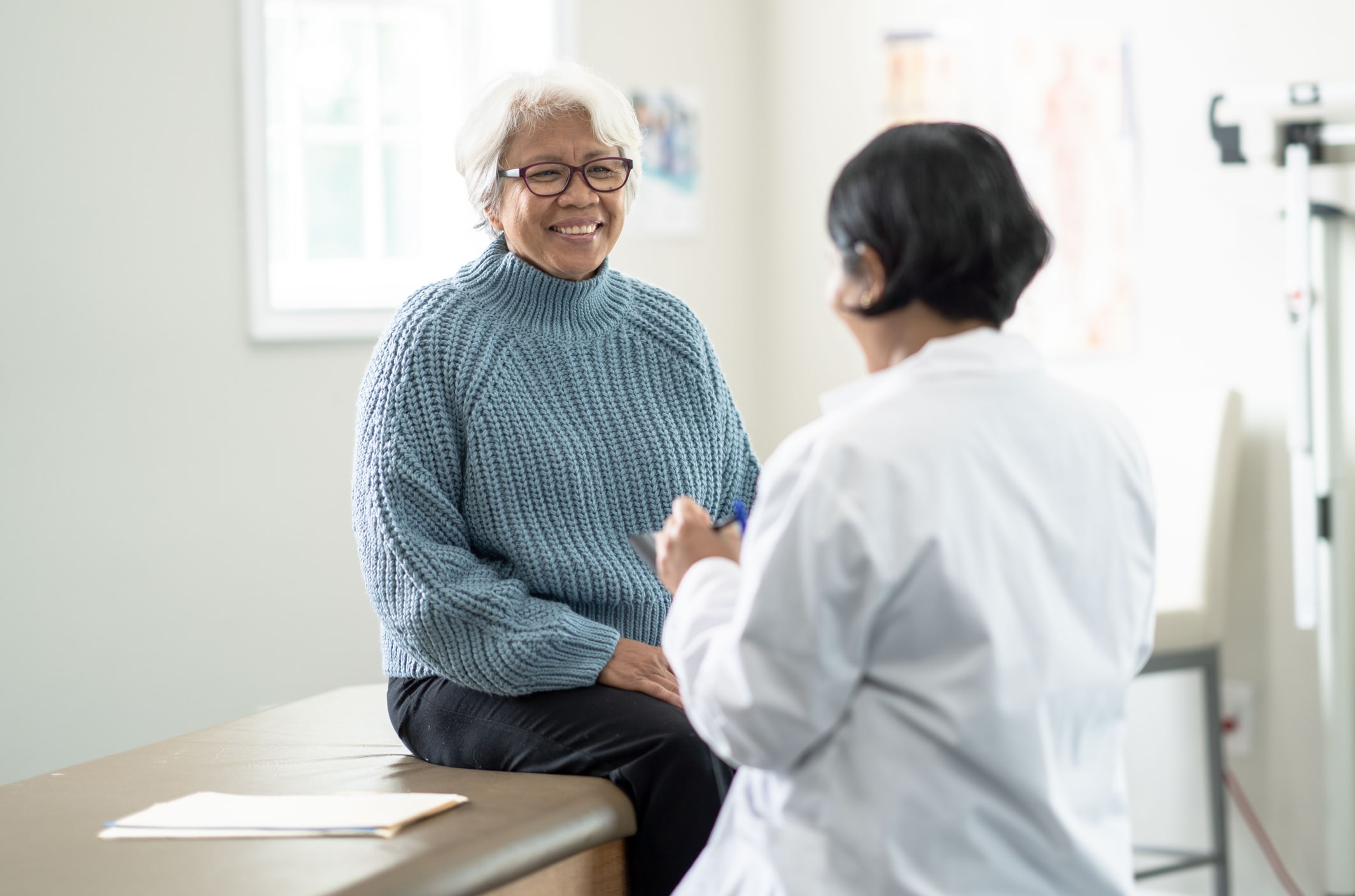 Elderly woman participating in a preventative health checkup for seniors