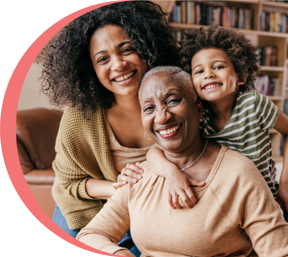 Family smiling with senior woman in the middle