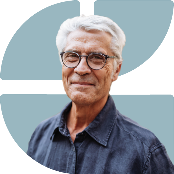 Senior man smiling with Greater Good Health logo